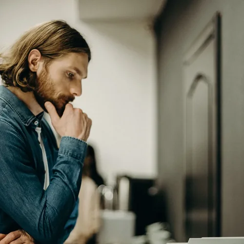 Person checking a printer that is offline or not printing