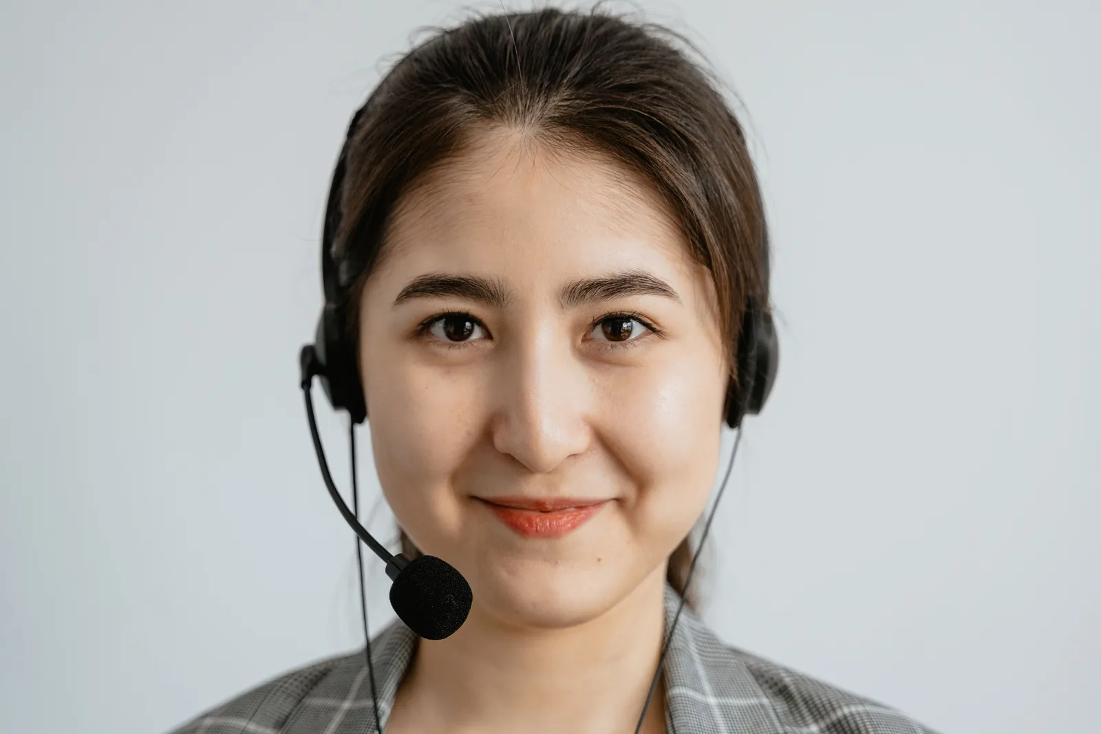 Customer support representative wearing a headset